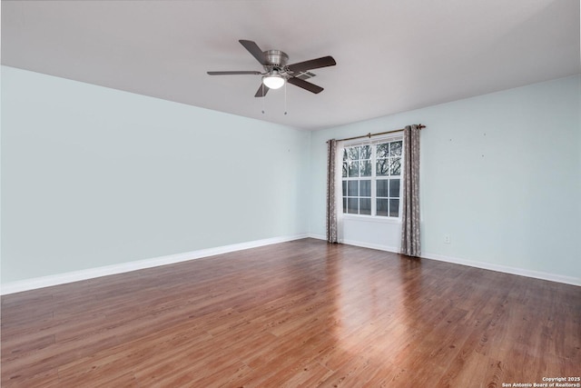 unfurnished room featuring hardwood / wood-style floors and ceiling fan