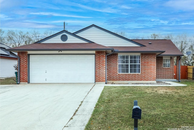 single story home featuring a front yard and a garage