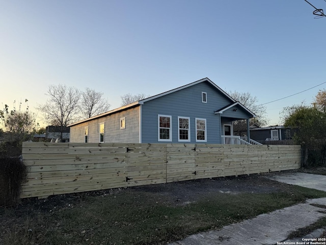 view of property exterior at dusk