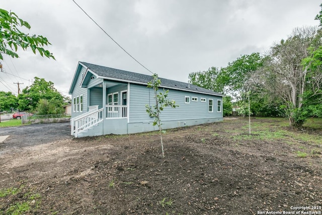 view of home's exterior with covered porch