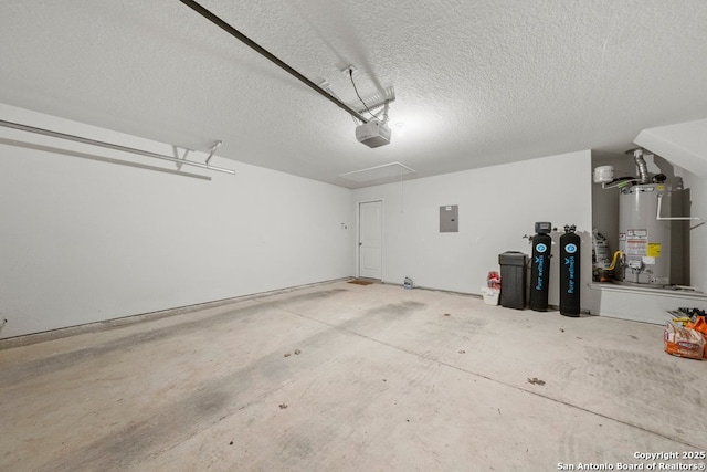 garage with electric panel, gas water heater, and a garage door opener