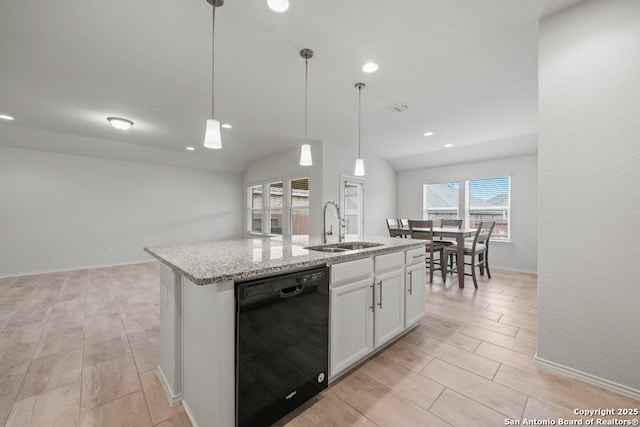 kitchen with white cabinets, a center island with sink, hanging light fixtures, sink, and black dishwasher