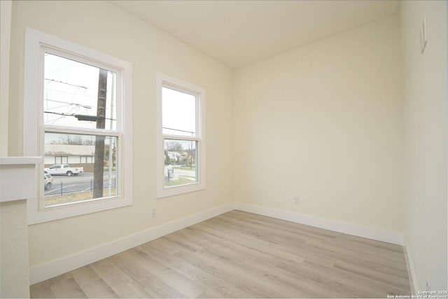 empty room with light wood-type flooring