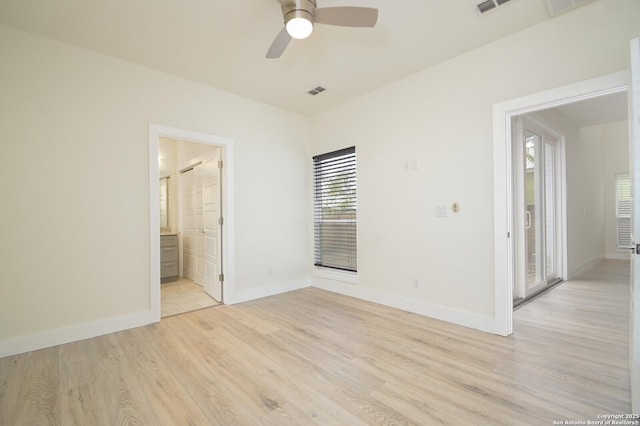 unfurnished bedroom with connected bathroom, ceiling fan, and light hardwood / wood-style floors