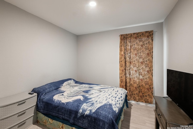 bedroom featuring light hardwood / wood-style flooring