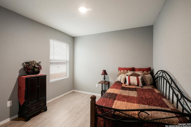 bedroom featuring light wood-type flooring