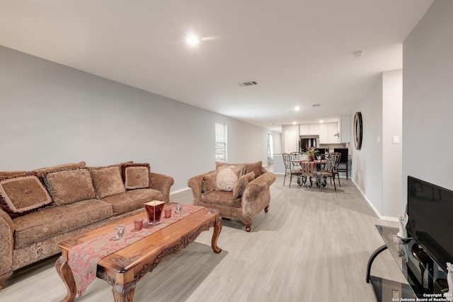 living room featuring light hardwood / wood-style floors