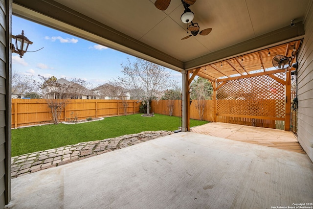 view of patio / terrace featuring ceiling fan