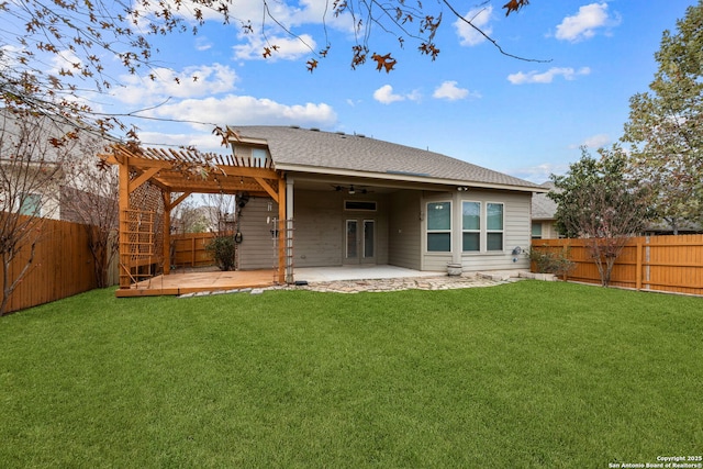 rear view of house with a lawn, a pergola, a patio area, and ceiling fan