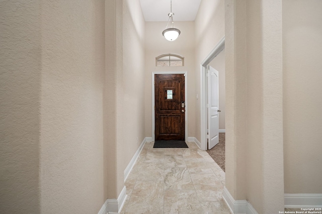 doorway with a high ceiling