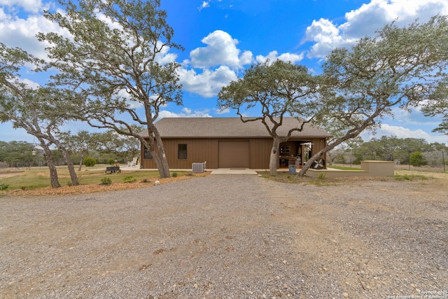 view of front of house featuring cooling unit