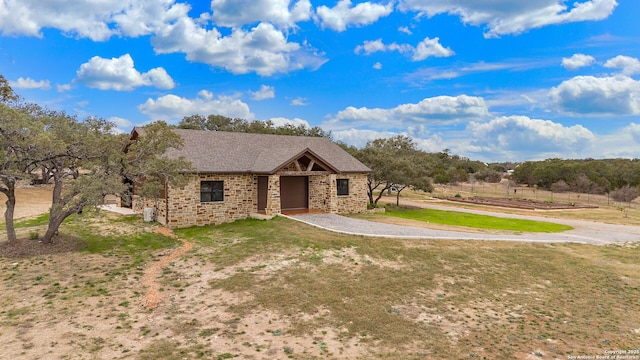 view of front of home with a front yard