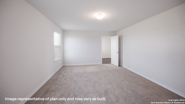 view of carpeted spare room