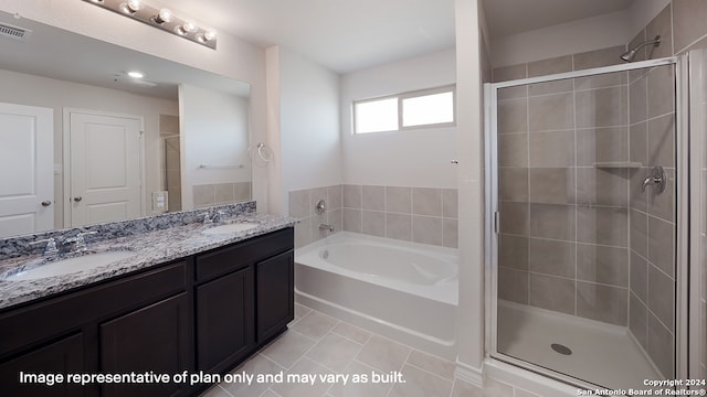 bathroom with tile patterned floors, plus walk in shower, and vanity