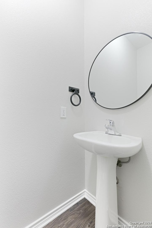 bathroom featuring hardwood / wood-style flooring