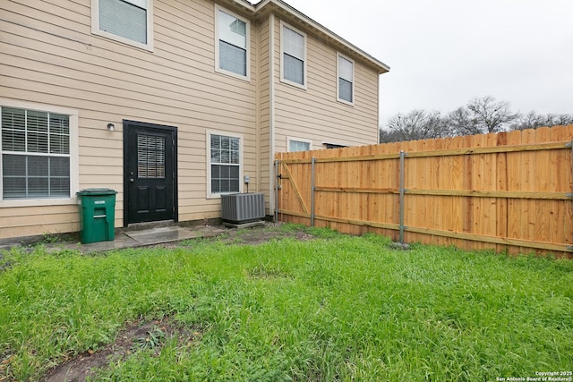 view of yard with central AC unit