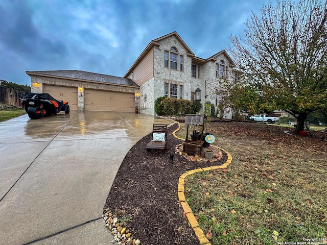 view of front of property featuring a garage