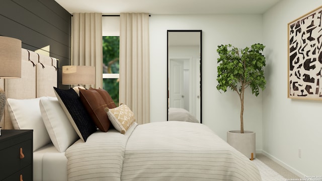 carpeted bedroom featuring wood walls