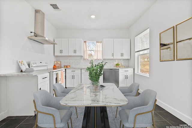 kitchen with white cabinetry and electric stove