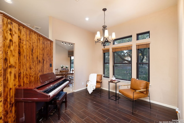 sitting room featuring an inviting chandelier and plenty of natural light