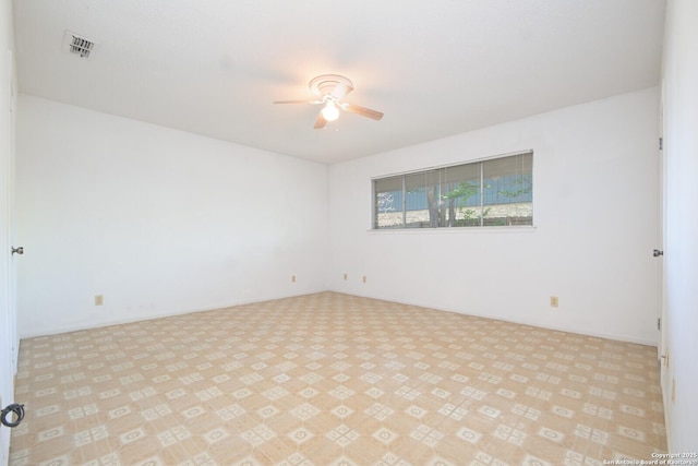 spare room featuring ceiling fan