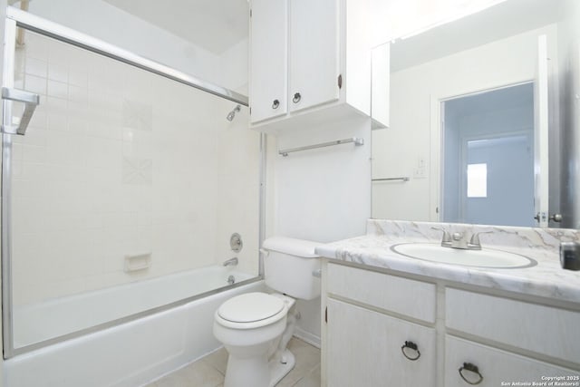 full bathroom with tile patterned floors, vanity, tub / shower combination, and toilet