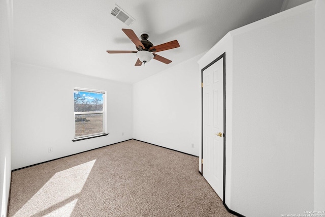 unfurnished bedroom with ceiling fan and light carpet