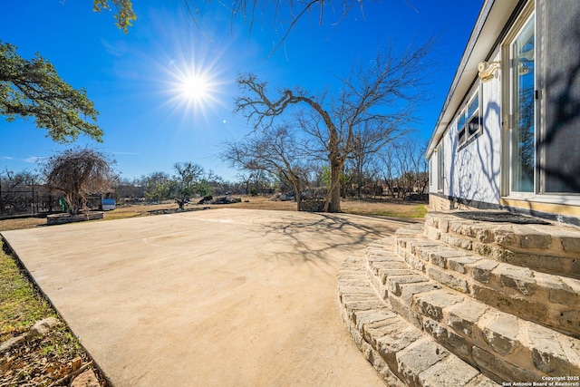 view of patio / terrace featuring basketball court