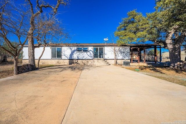 single story home with cooling unit