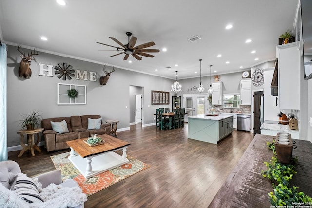 living room featuring ceiling fan, dark wood-type flooring, and ornamental molding