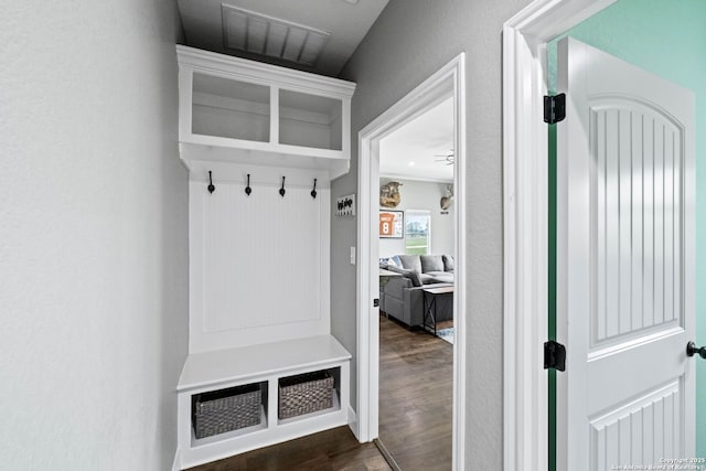 mudroom with dark hardwood / wood-style flooring and ceiling fan