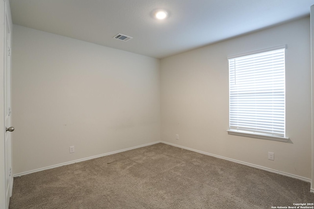 view of carpeted spare room