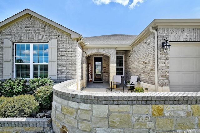 property entrance featuring a garage