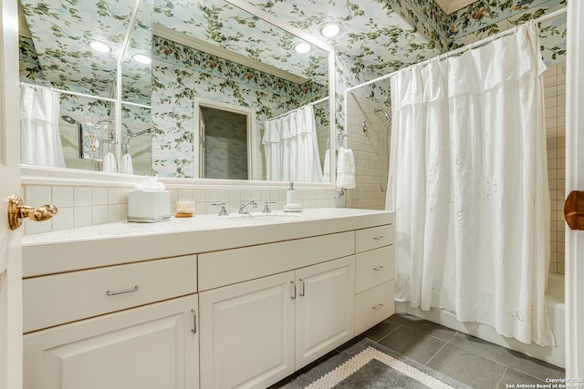 bathroom featuring backsplash, tile patterned flooring, vanity, and shower / tub combo with curtain