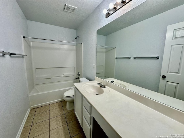 full bathroom with tile patterned flooring, a textured ceiling, toilet, shower / tub combination, and vanity