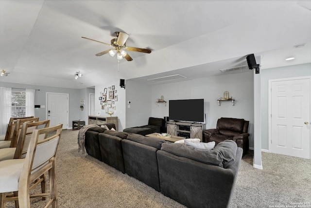 living room with ceiling fan and carpet floors