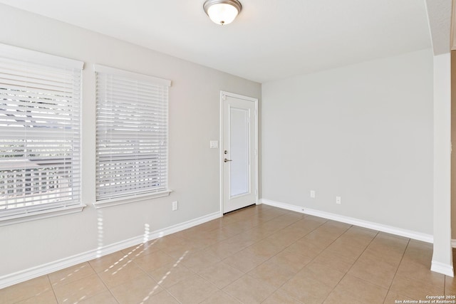 view of tiled spare room