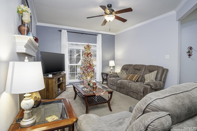 living room featuring ceiling fan, light colored carpet, a textured ceiling, and ornamental molding