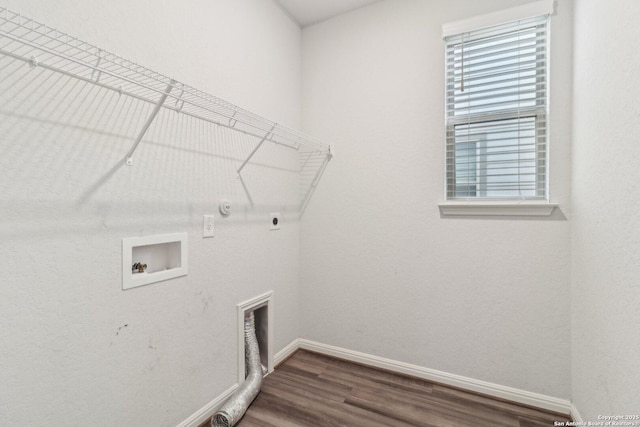 laundry area featuring electric dryer hookup, gas dryer hookup, washer hookup, and dark hardwood / wood-style floors