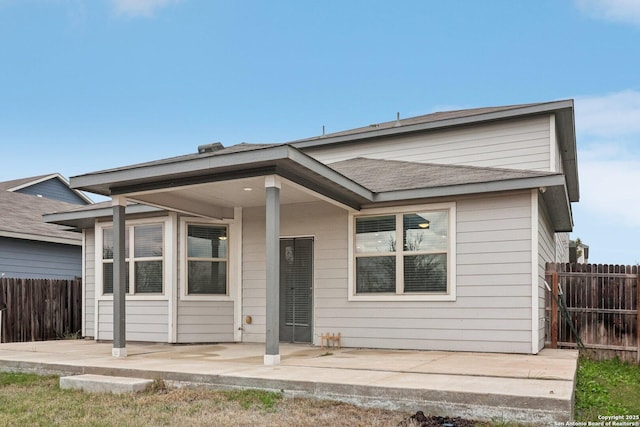 rear view of house with a patio area