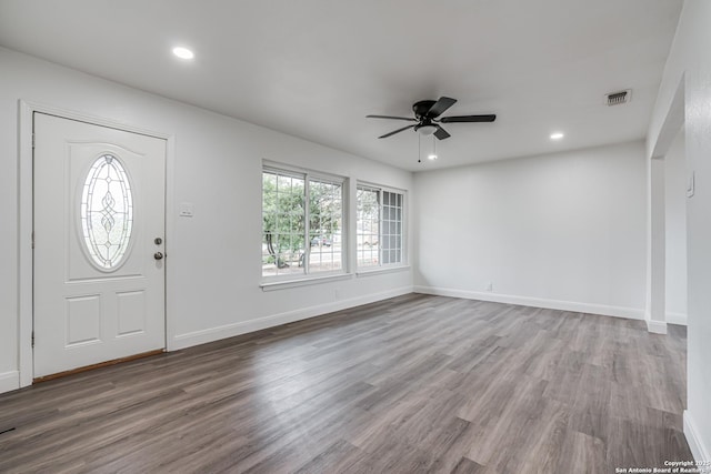 foyer with hardwood / wood-style flooring and ceiling fan