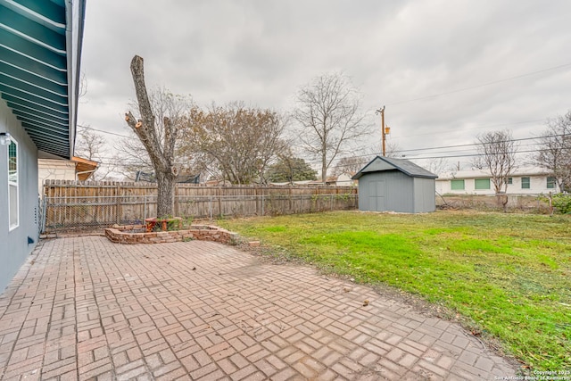 view of patio / terrace with a shed