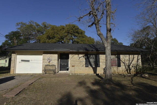 single story home featuring a garage