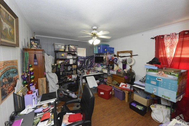 office area with ceiling fan, wood-type flooring, and a textured ceiling