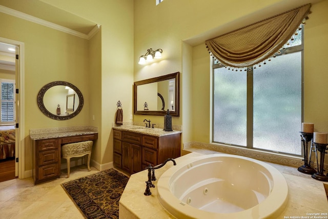 bathroom with tile patterned floors, tiled bath, crown molding, and vanity