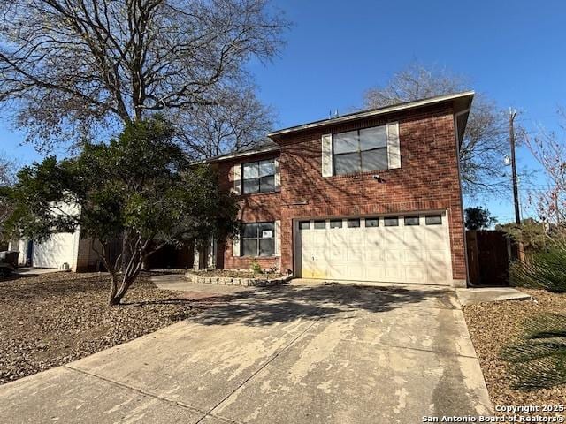 front of property with a garage