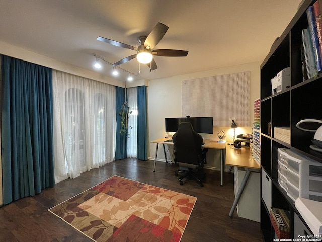 office area featuring dark wood-type flooring and ceiling fan