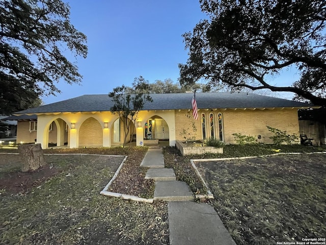 view of front of home with a front yard