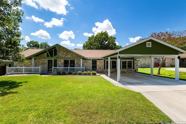 view of front facade featuring a front yard and a carport