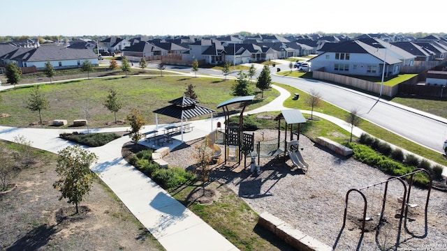 view of home's community with a playground